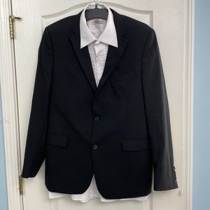Men’s bundle dress suit coat with a White pleated front dress/ tuxedo  shirt